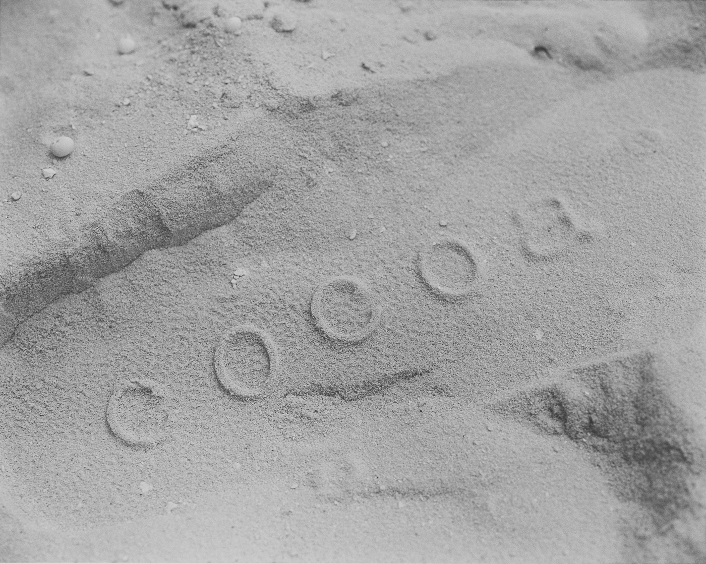 Fußabdruck im Sandstrand des COMO Cocoa Island